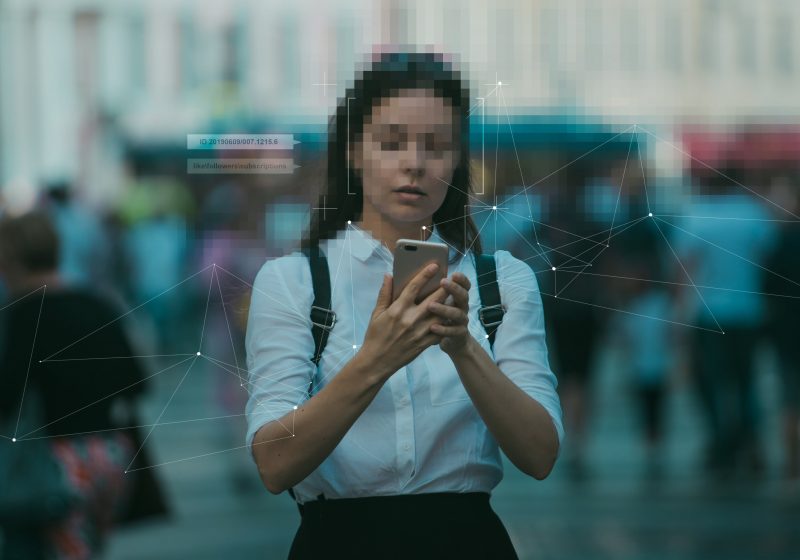 Phone scanning lady's facial features